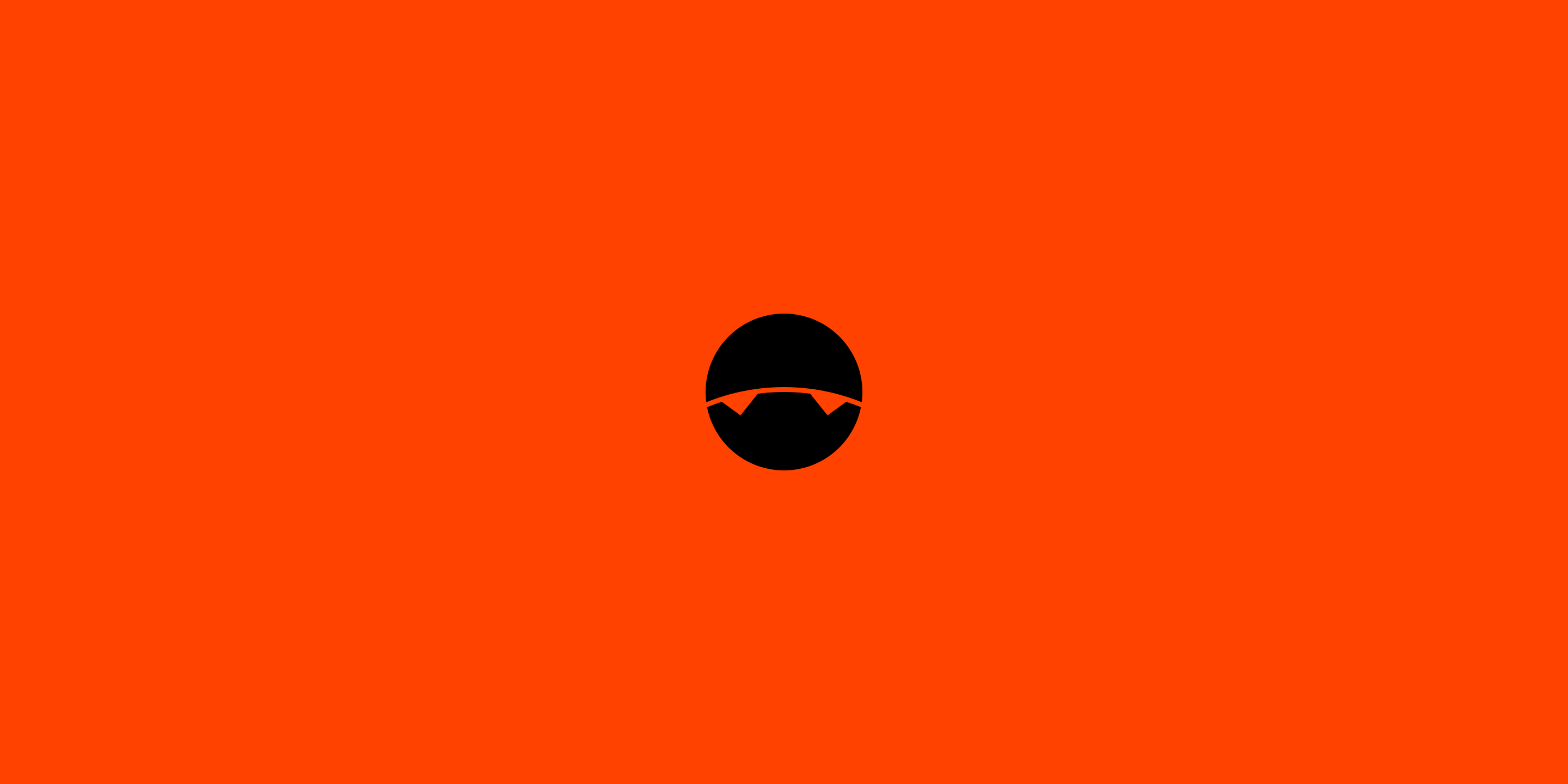 The mark in black on an orange badge